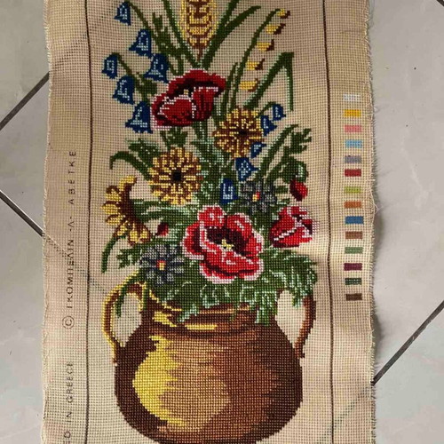 Handmade embroidery artwork with wildflowers in copper pot like new