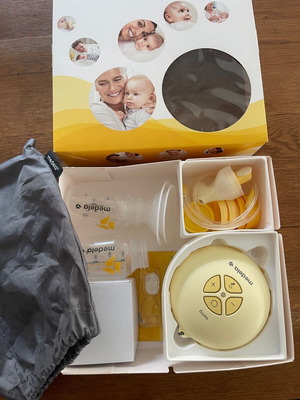 Medela Swing Flex electric single breast pump like new, yellow 630065