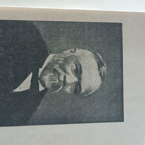 Books from early 20th century used, one cut in two