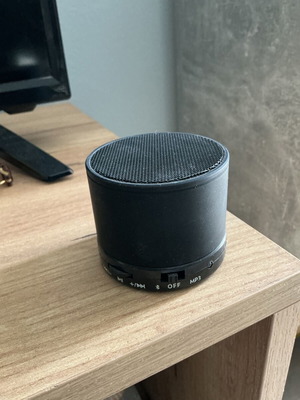 Bluetooth speaker like new, fully functional with charging cable