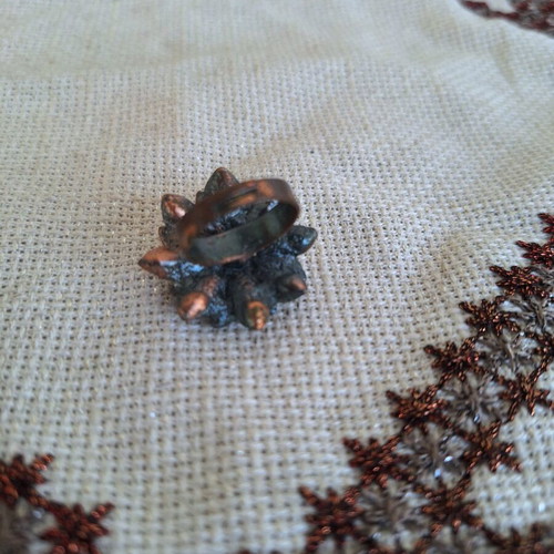 Bronze flower ring with pink rhinestones used