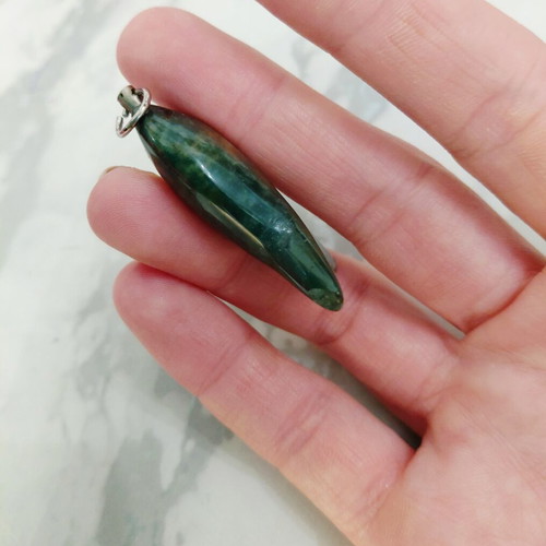 Vintage pendant from the 70s, used with wear on fish tail