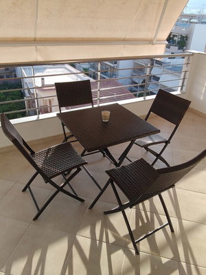 Garden table 70x70 with 4 chairs like new plastic