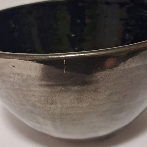 Eleni Vernadaki ADC studio pottery bowl with silver metallic surface