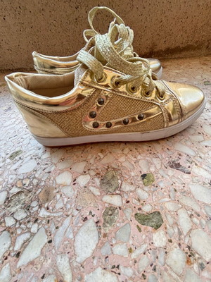 Women’s gold flat sport shoes size 38 like new