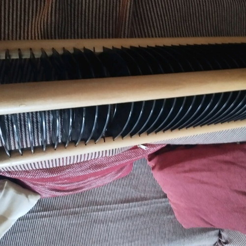 CD rack beige wood with black holders, 30 slots, like new