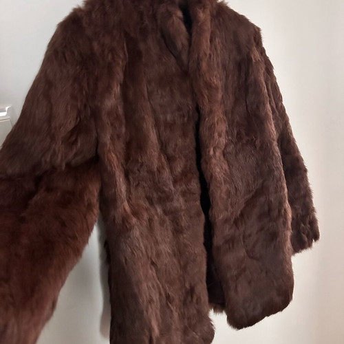 Authentic natural fur in chocolate color like new, size M
