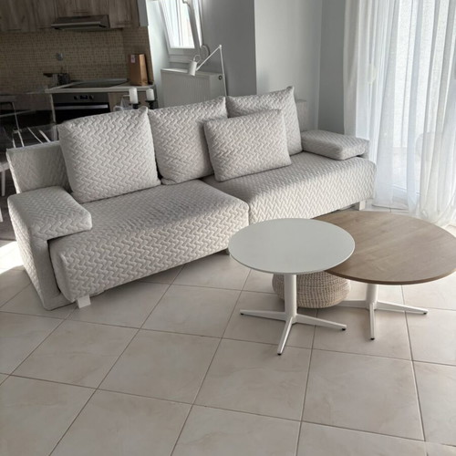 Two-seater sofa with two stools and tables like new