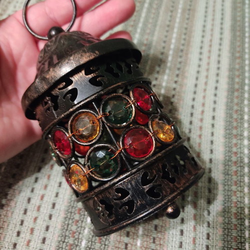 Metal lantern with colorful stones, ethnic style