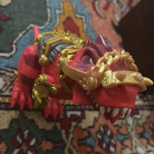 Treasure X red dinosaur toy used