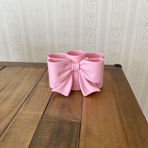 Makeup brush holder 3D print, like new, plastic bow design