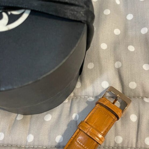 Oxette wristwatch used, brown leather strap, gold details