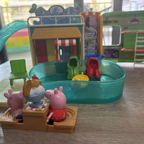 Peppa Pig toy set with camper, pool and Cocomelon house
