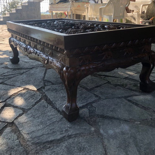 Handcrafted carved wood table with elephants and matching stool, Asian style