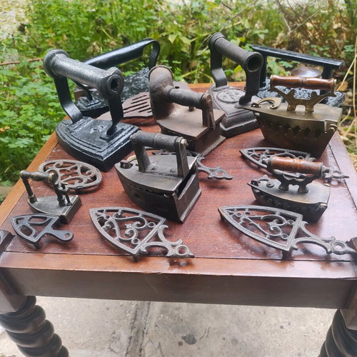 Collection of 19th century collar irons like new with bases