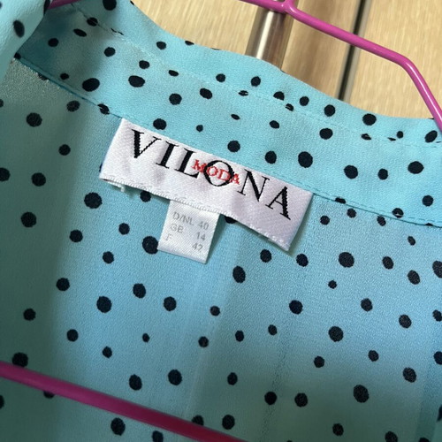 Turquoise short-sleeve polka dot shirt