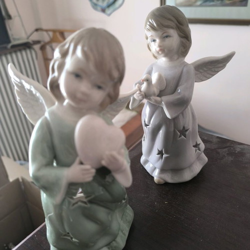 Angel candle holders like new, set of two