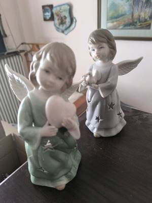 Angel candle holders like new, set of two