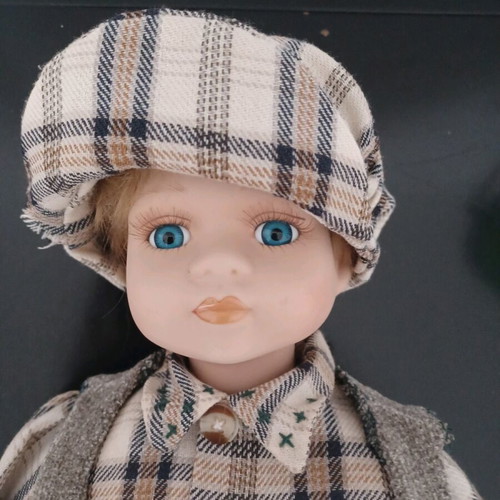 Porcelain doll used, 50 cm, in good condition