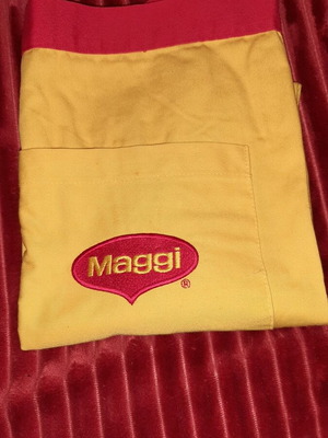 Maggi kitchen apron new, yellow collectible