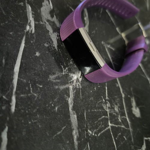 Fitbit Charge 2 smartwatch like new with purple strap and charger