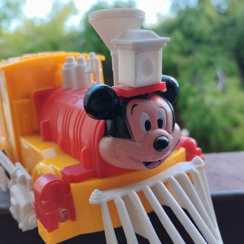 Mickey train vintage with movement and whistle, includes battery