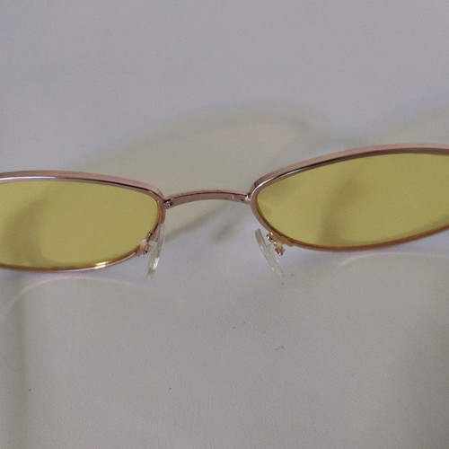 Sunglasses used with yellow lens and lightweight frame