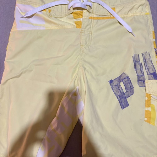 Puma men's yellow swim shorts, new