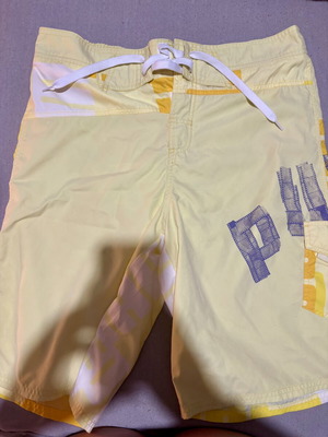 Puma men's yellow swim shorts, new