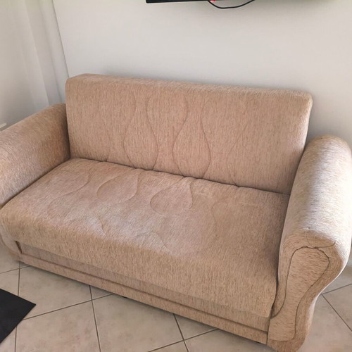 Two-seater sofa bed, beige fabric with storage