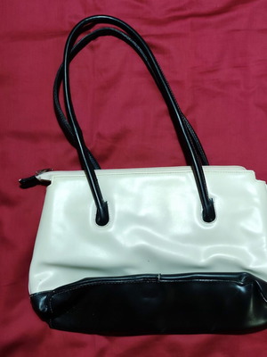 Women's vintage 1950 handbag used, leather texture, black and white