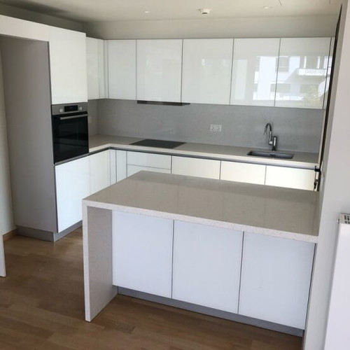 White lacquer kitchen with glass and countertop new