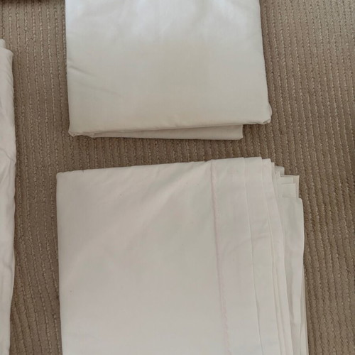 Set of embroidered cotton bed sheets, pillowcases and duvet covers