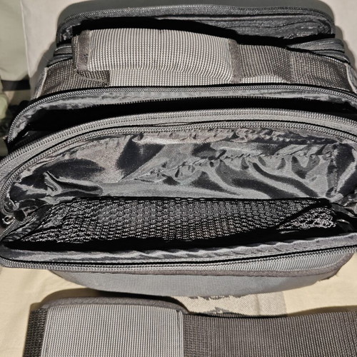 Nikon camera bag like new with shoulder strap and multiple compartments