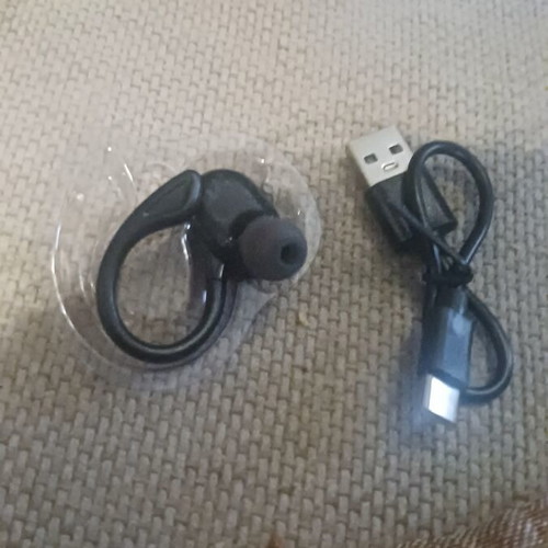 Earbud with behind-ear support and charging cable new