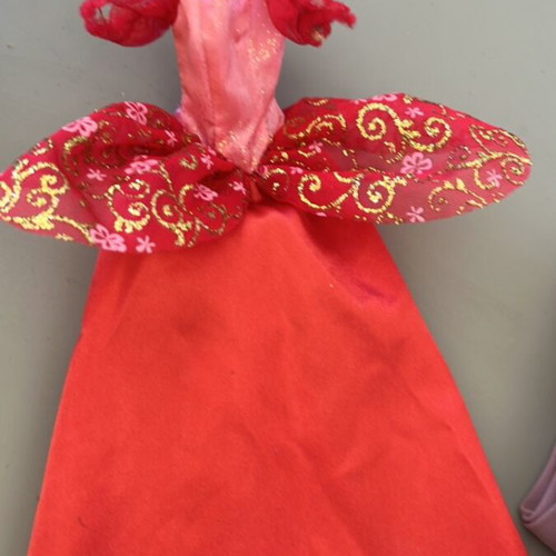 Barbie dress used, sleeve defect needs repair