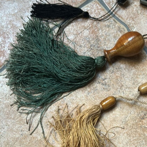 Decorative komboloi set like new, two wooden brown and one black and white