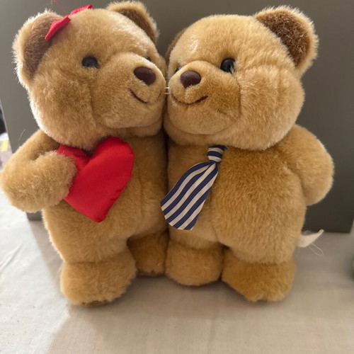 Plush teddy bear couple with heart and striped tie