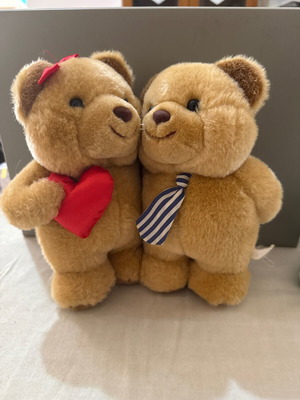 Plush teddy bear couple with heart and striped tie
