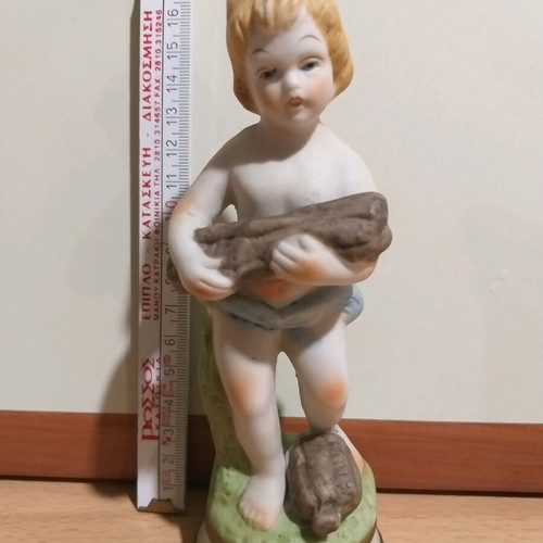Porcelain figurine of a child vintage, like new