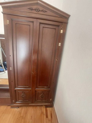 Wardrobe made of solid wood used, heavy construction