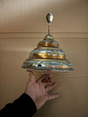 Old iron spinning top used in moderate condition