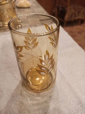Set of 7 glasses with metal base vintage like new