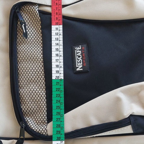 Backpack new, beige and black, durable material
