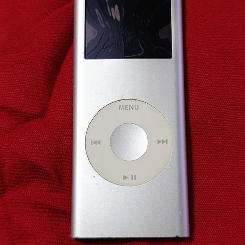 Apple MP3 digital music player with cracked screen