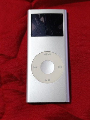 Apple MP3 digital music player with cracked screen