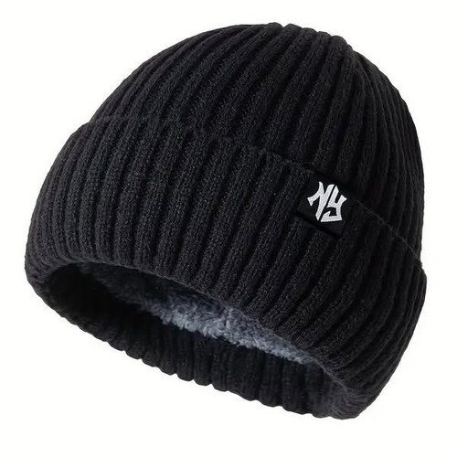 Warm knitted hat with fur lining and NY decoration new, black
