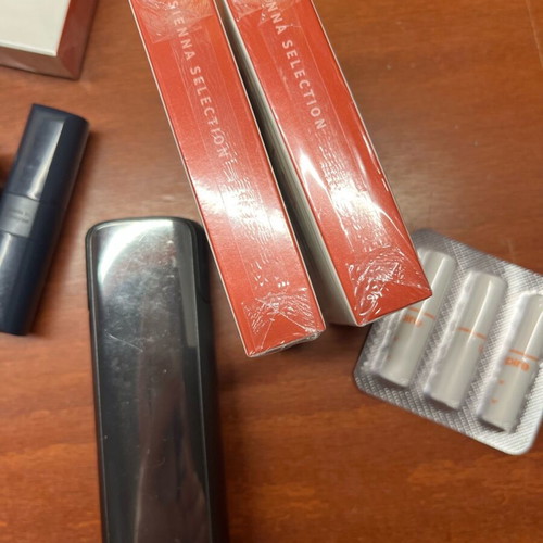 Iqos lil solid like new with accessories and 4 packs