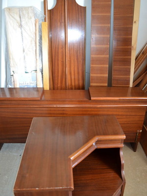 Double bed with nightstand used, storage space included
