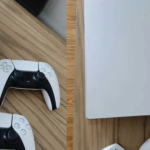 PlayStation 5 like new with 8 games and 2 controllers